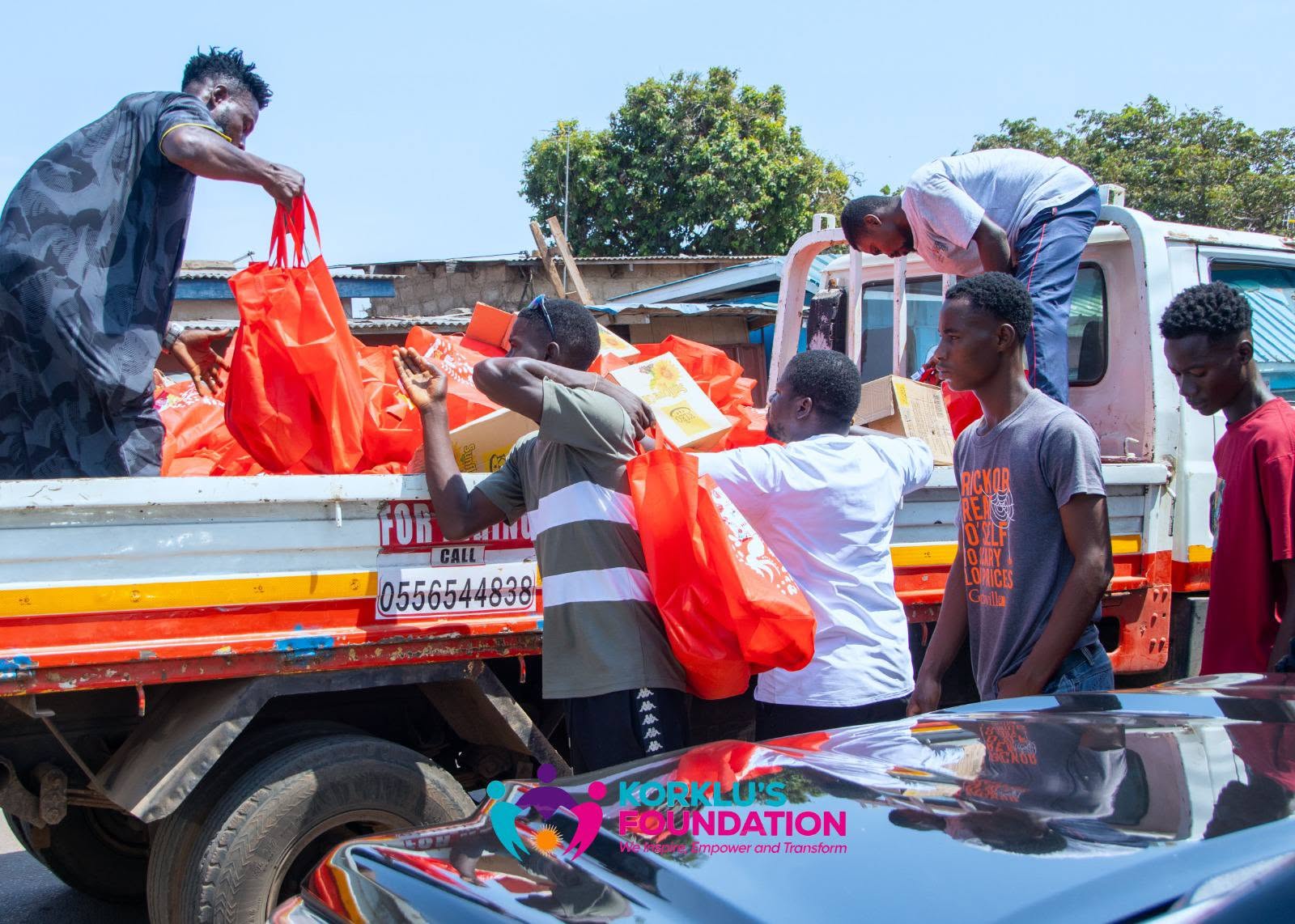 Volunteers unload food donations for New Year outreach